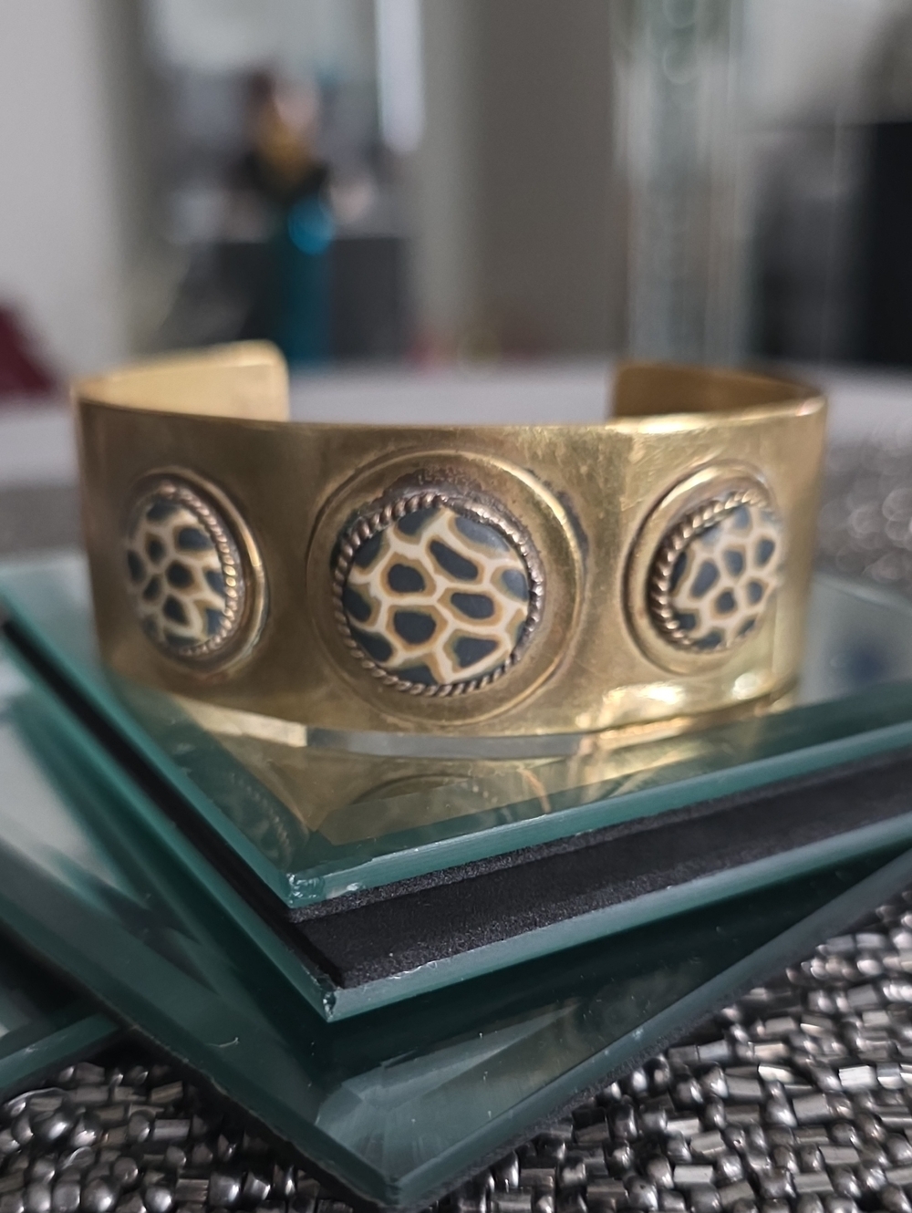 Gold-Tone Decorative Cuff Bracelet with Cream and Blue Accents